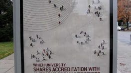 UOPX Educated World bus stop ad